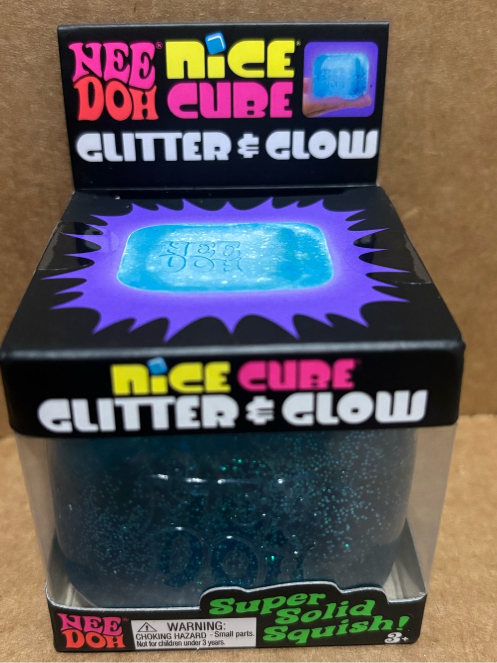 Nee Doh Nice Cube Glitter & Glow Squish Toy -Blue
